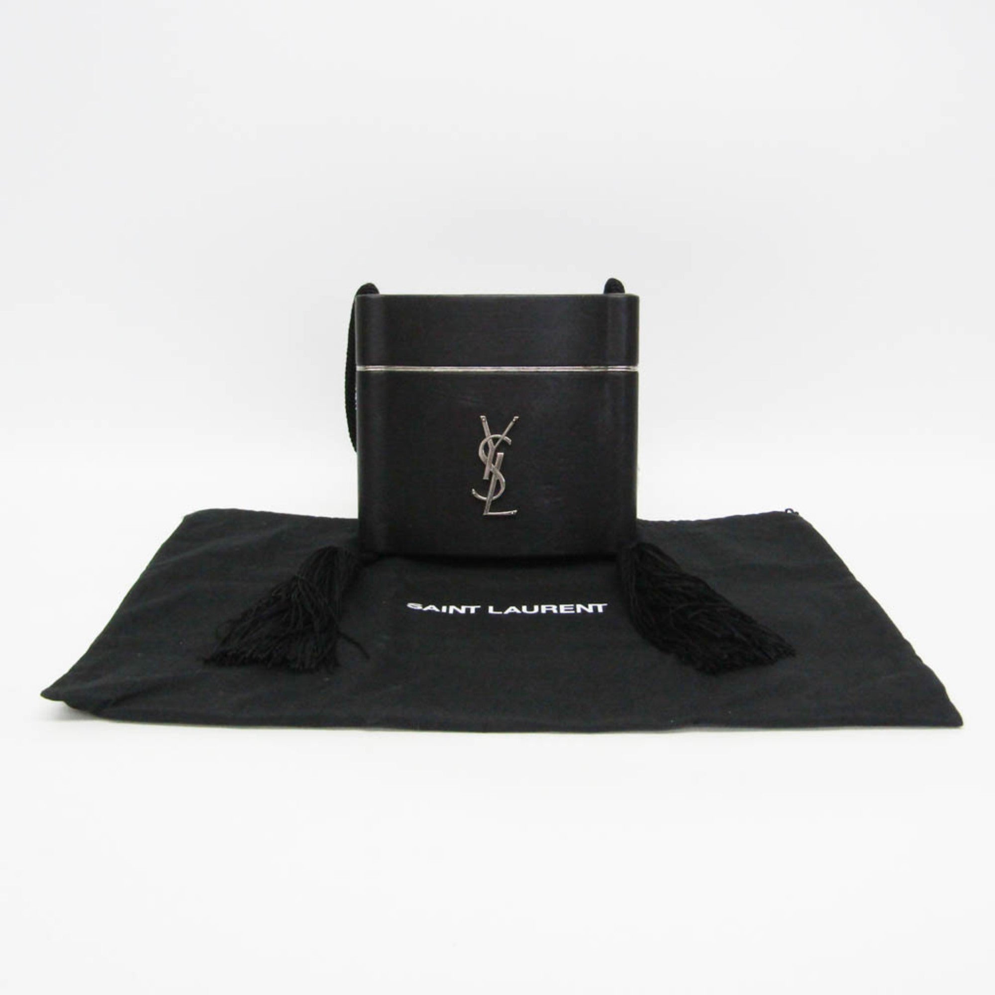 Yves Saint Laurent Opium · Leather