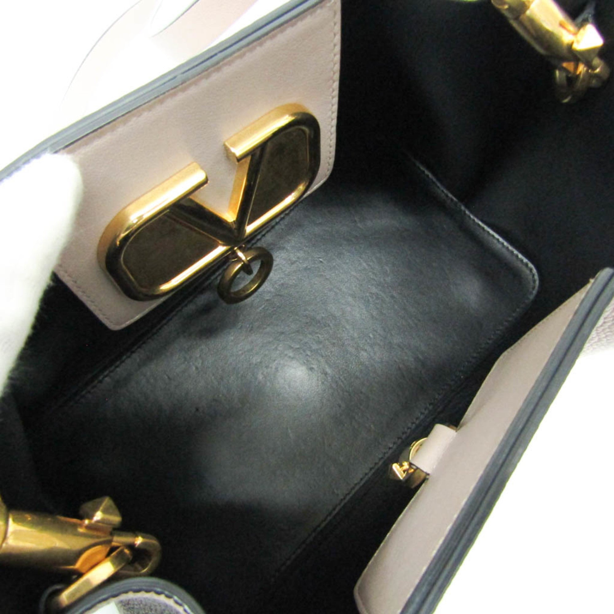 Valentino Garavani V Logo Escape · Leather