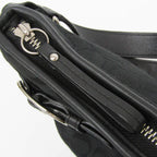 Coach Signature · Canvas & Leather