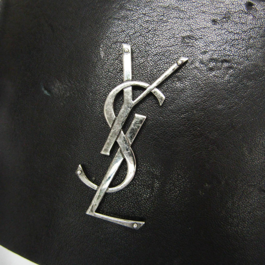 Yves Saint Laurent Opium · Leather