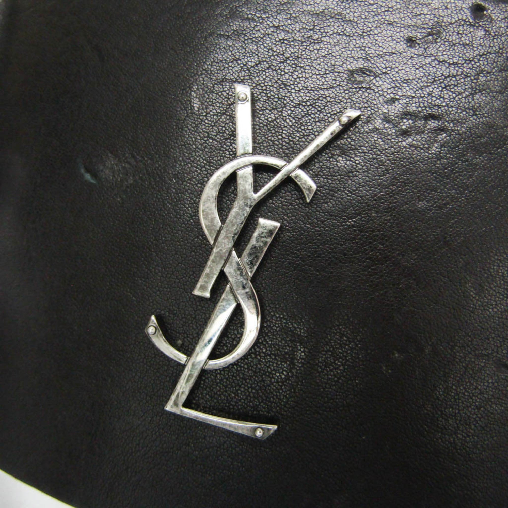 Yves Saint Laurent Opium · Leather