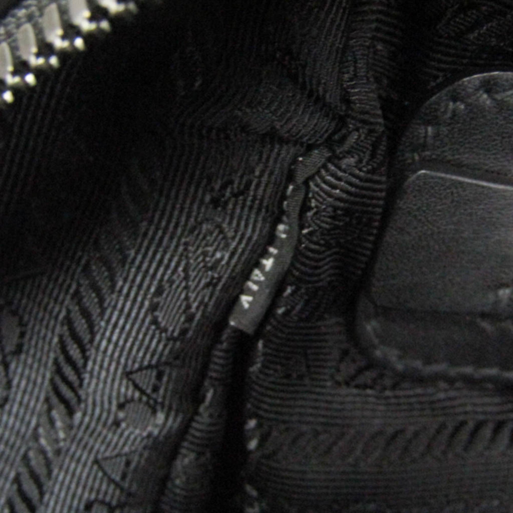 Prada Toro · Leather Backpack