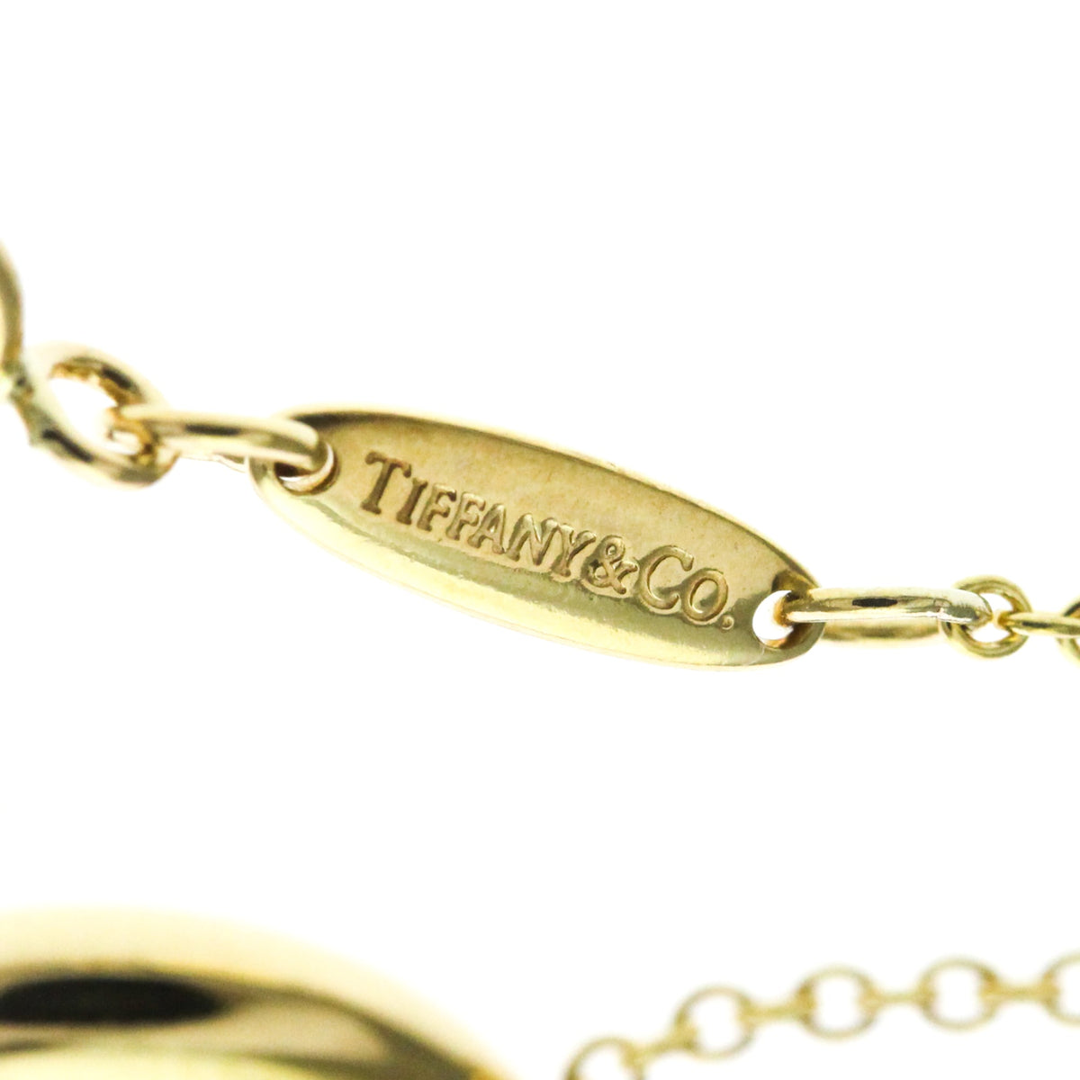 Tiffany Sebiana · 18K Yellow Gold