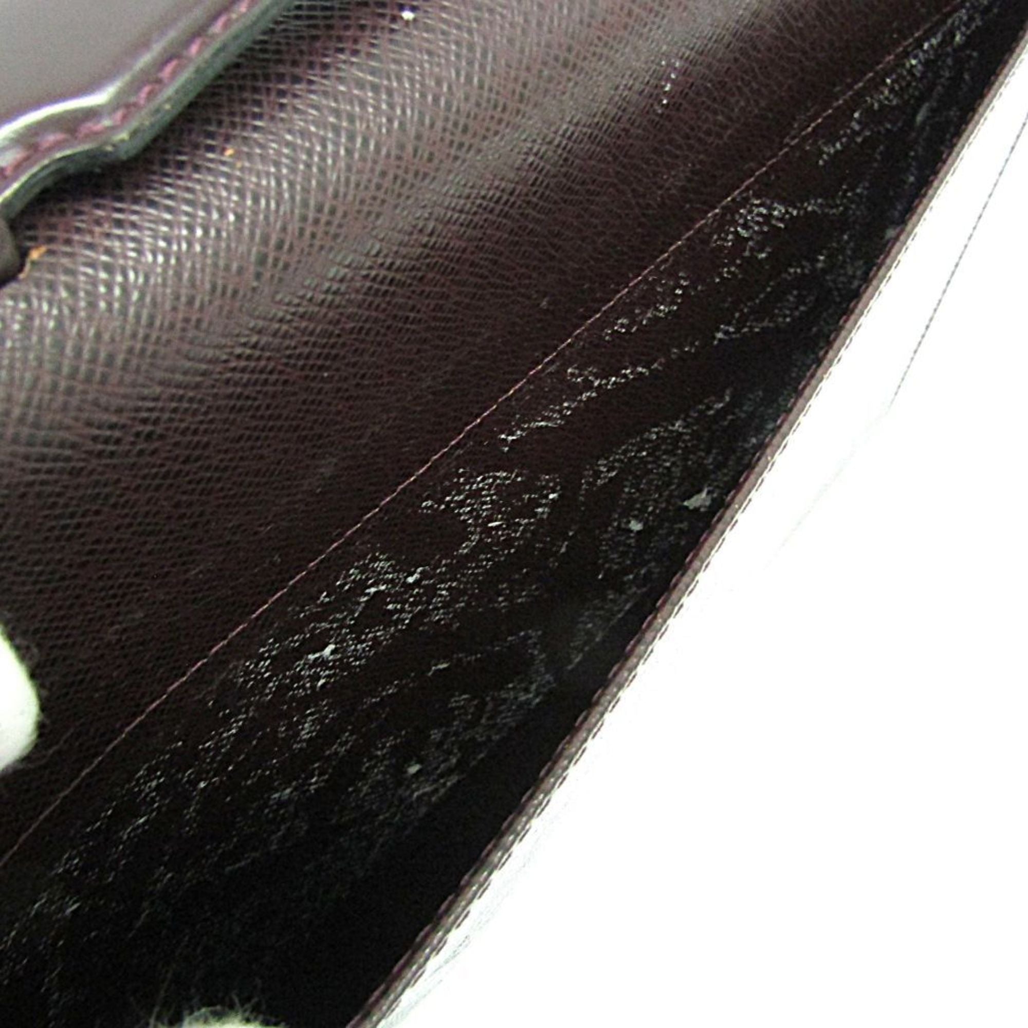 Louis Vuitton Serviette Clado · Taiga