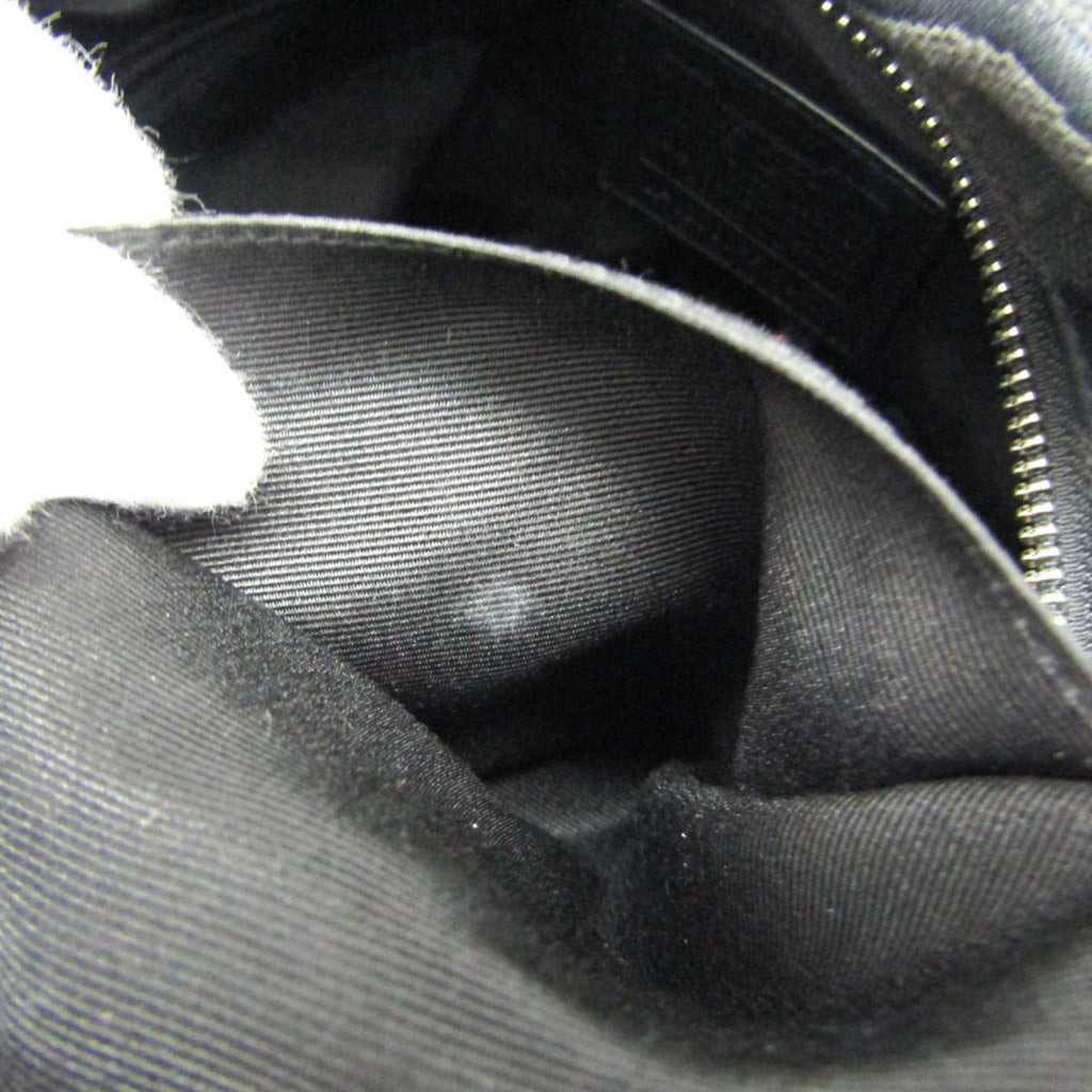 Coach Signature · Canvas & Leather