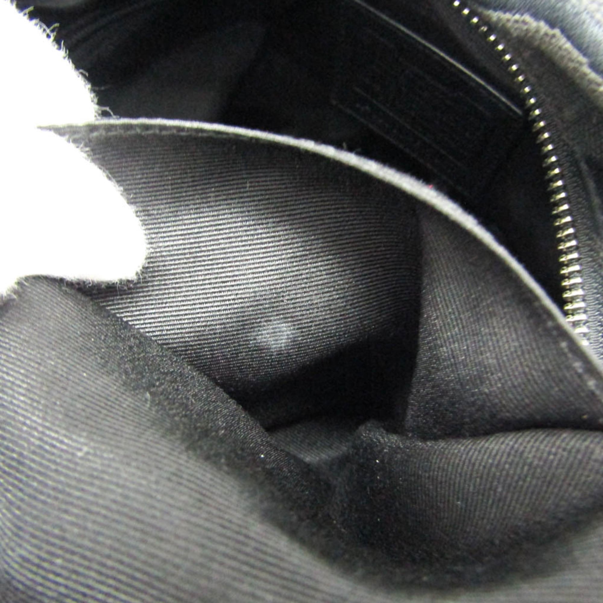 Coach Signature · Canvas & Leather