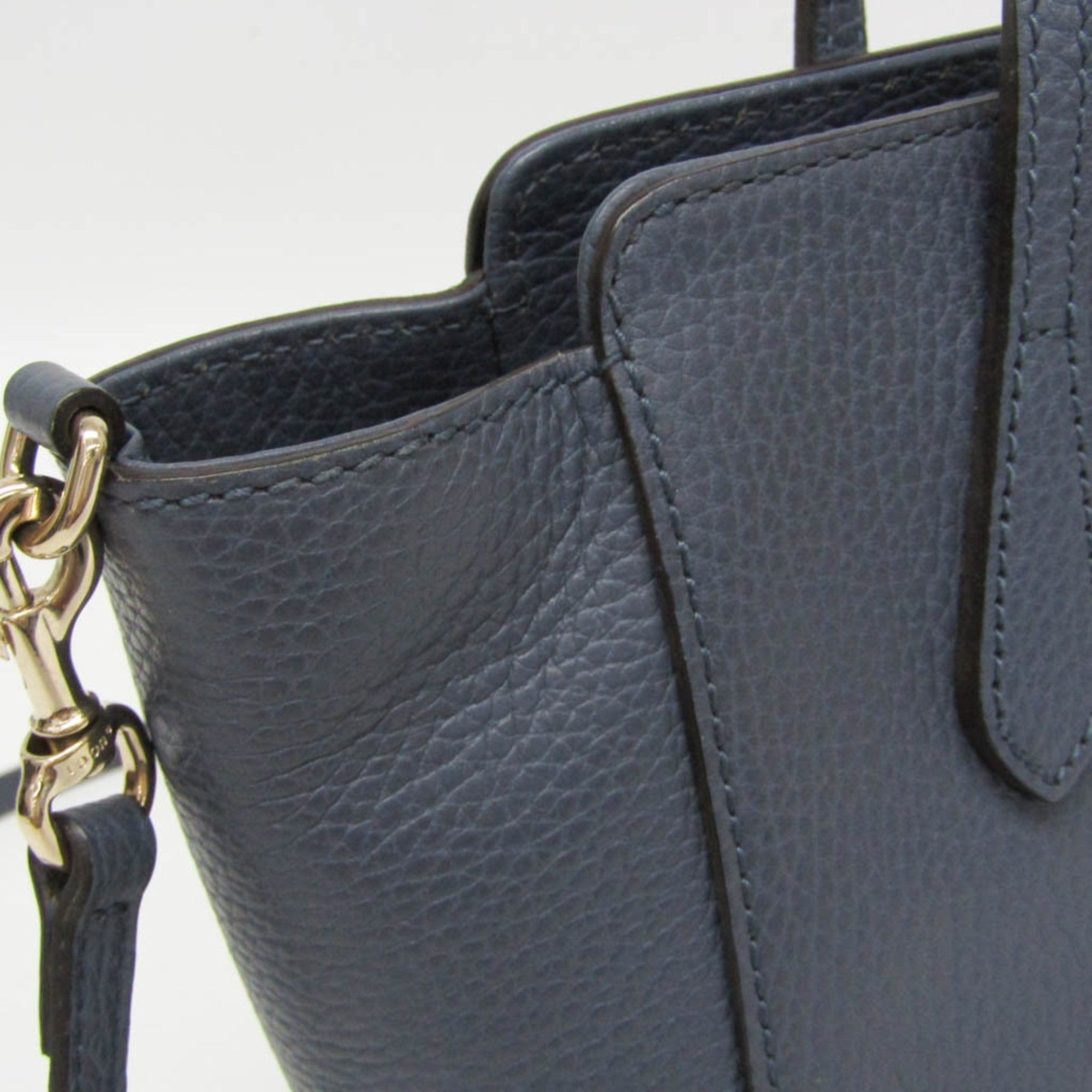Gucci Swing · Leather