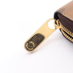 Louis Vuitton Zippy · Monogram Reverse