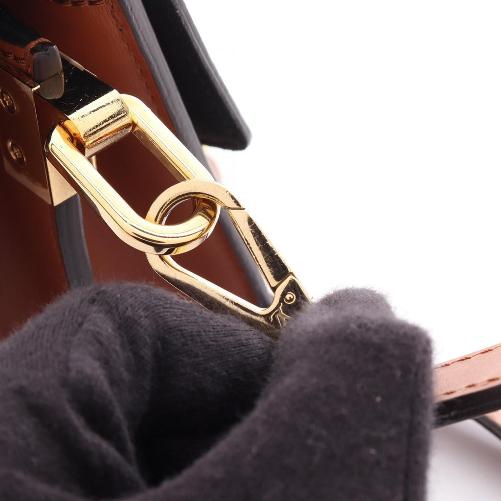 Louis Vuitton Dauphine Mini · Monogram Reverse