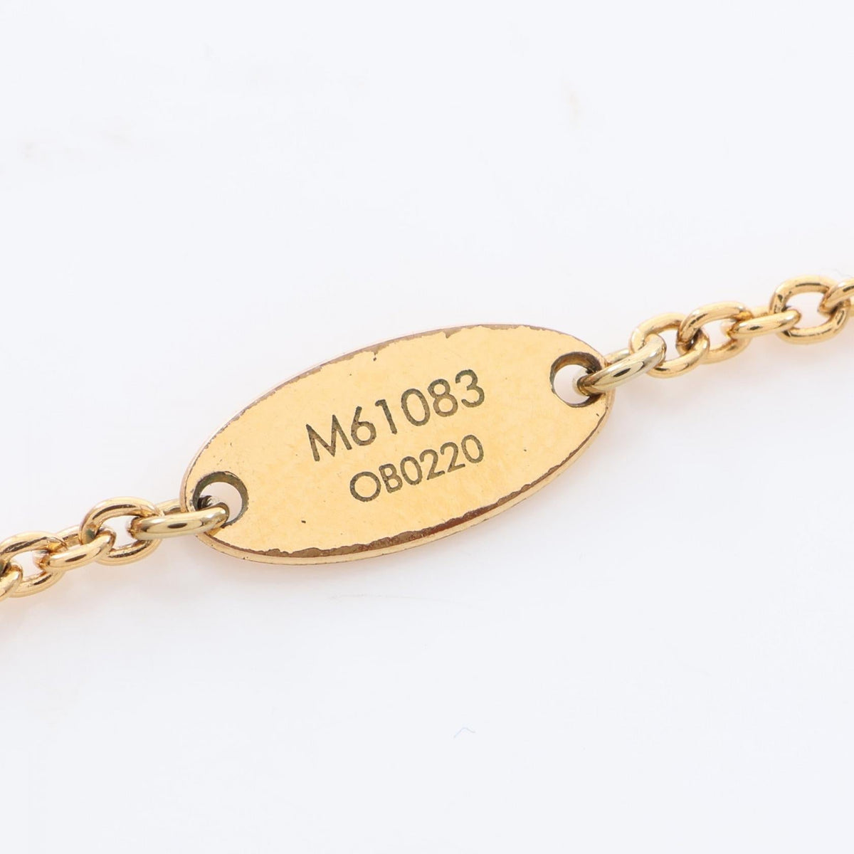 Louis Vuitton Essential V · Gold Plated