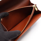 LOUIS VUITTON Pochette Monnaie · Monogram