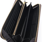 Louis Vuitton Zippy · Monogram Giant Reverse