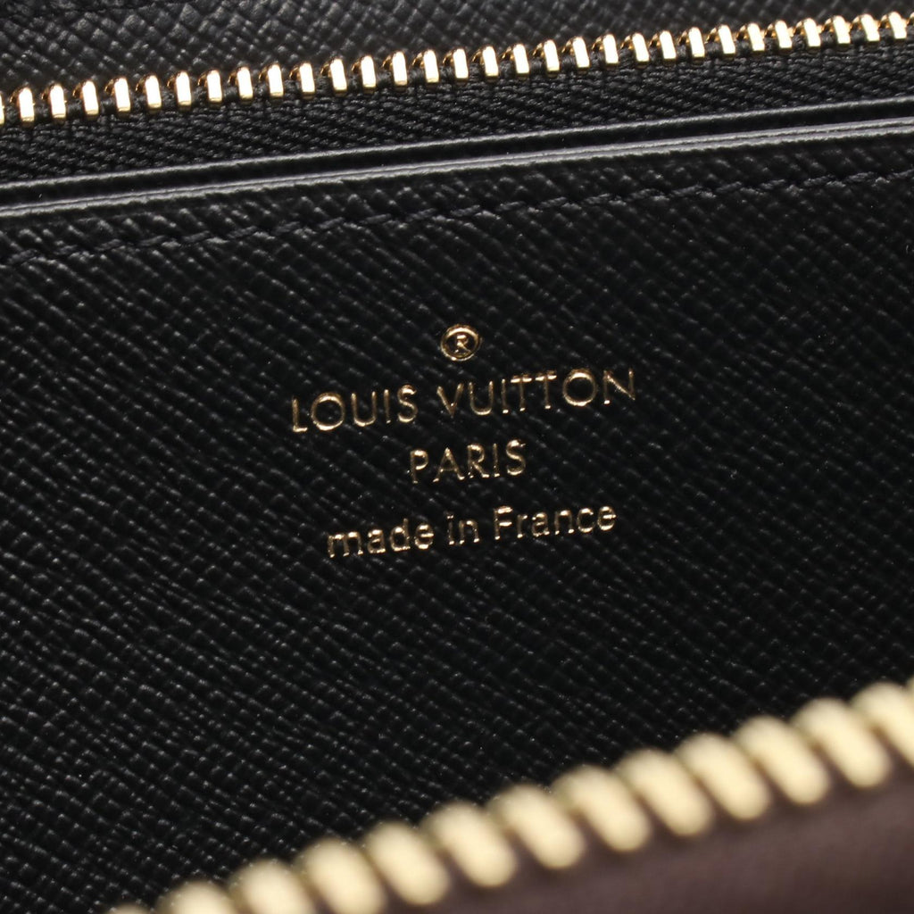 Louis Vuitton Zippy · Monogram Giant Reverse