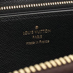 Louis Vuitton Zippy · Monogram Giant Reverse