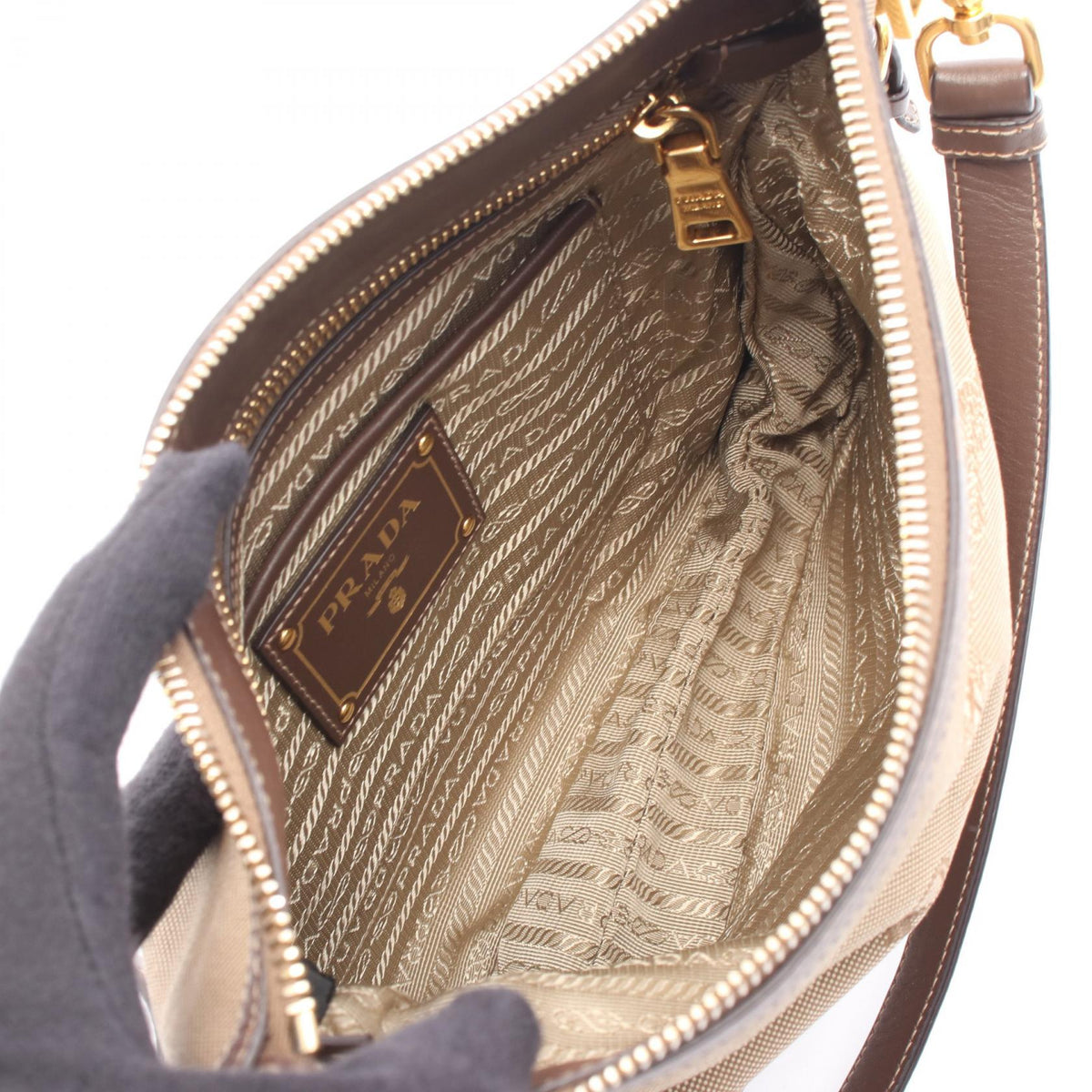 Prada Logo Jacquard · Canvas Leather