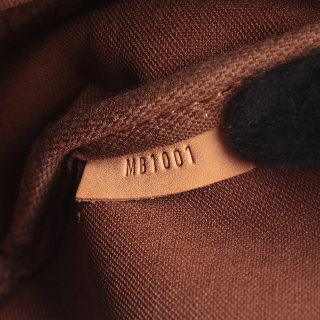 Louis Vuitton Saumur 30 · Monogram Canvas