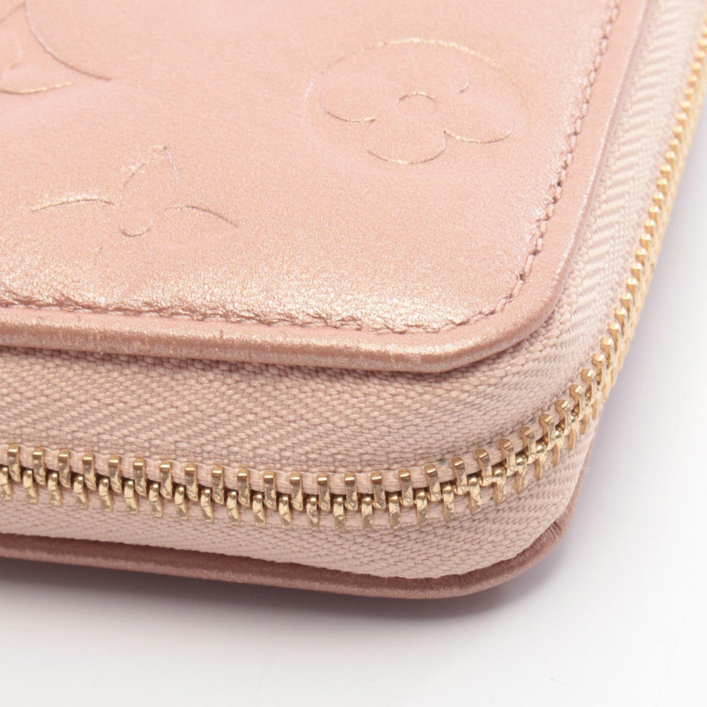 Louis Vuitton Coussin · Monogram Embossed