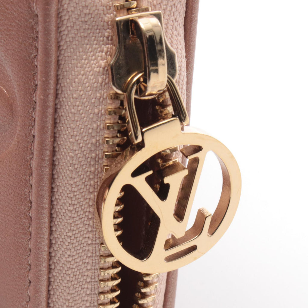 Louis Vuitton Coussin · Monogram Embossed