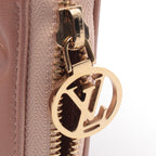 Louis Vuitton Coussin · Monogram Embossed