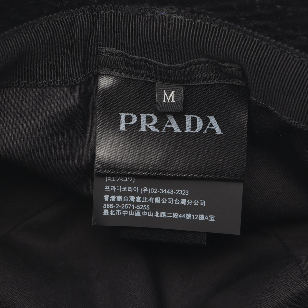 Prada Triangular Plate · Corduroy Bucket Hat