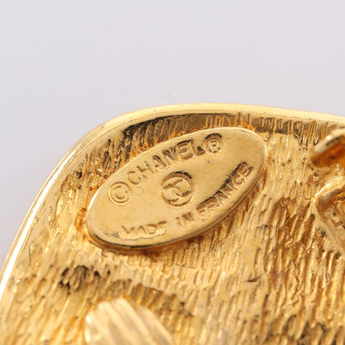 CHANEL Matelassé Earrings · Gold Plated
