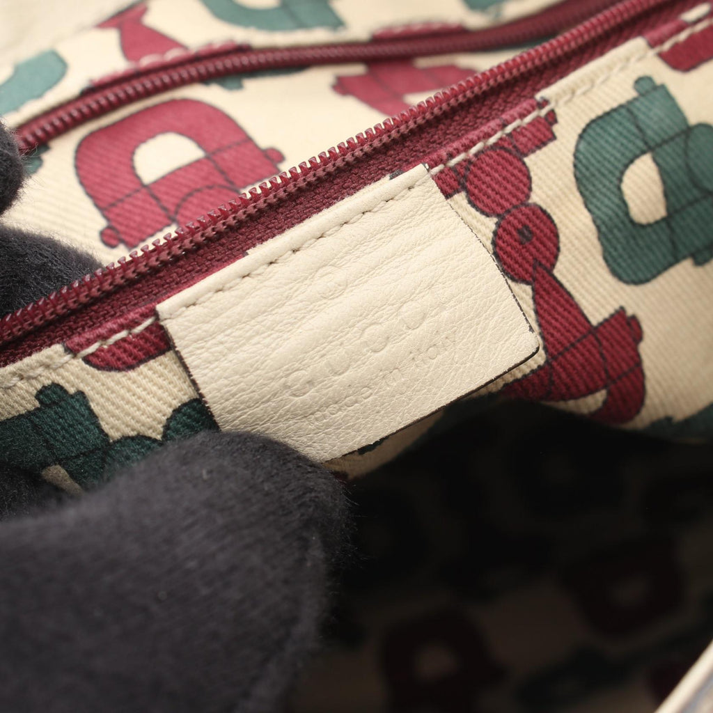 Gucci Guccissima · Drawstring Crossbody