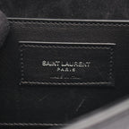 Saint Laurent Paris · Embossed Clutch
