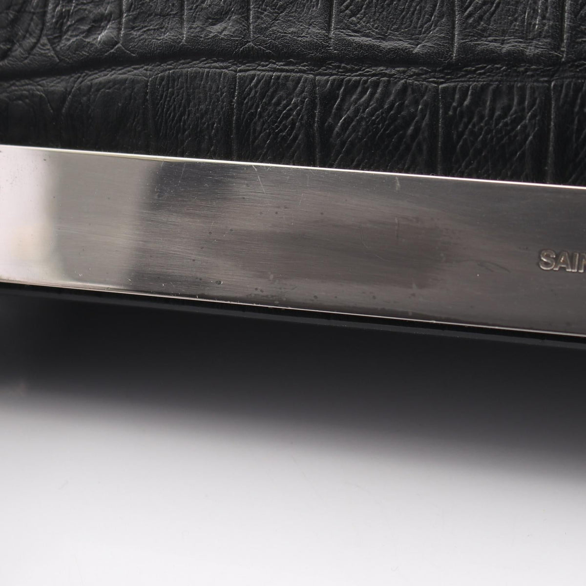 Saint Laurent Paris · Embossed Clutch