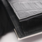 Saint Laurent Paris · Embossed Clutch