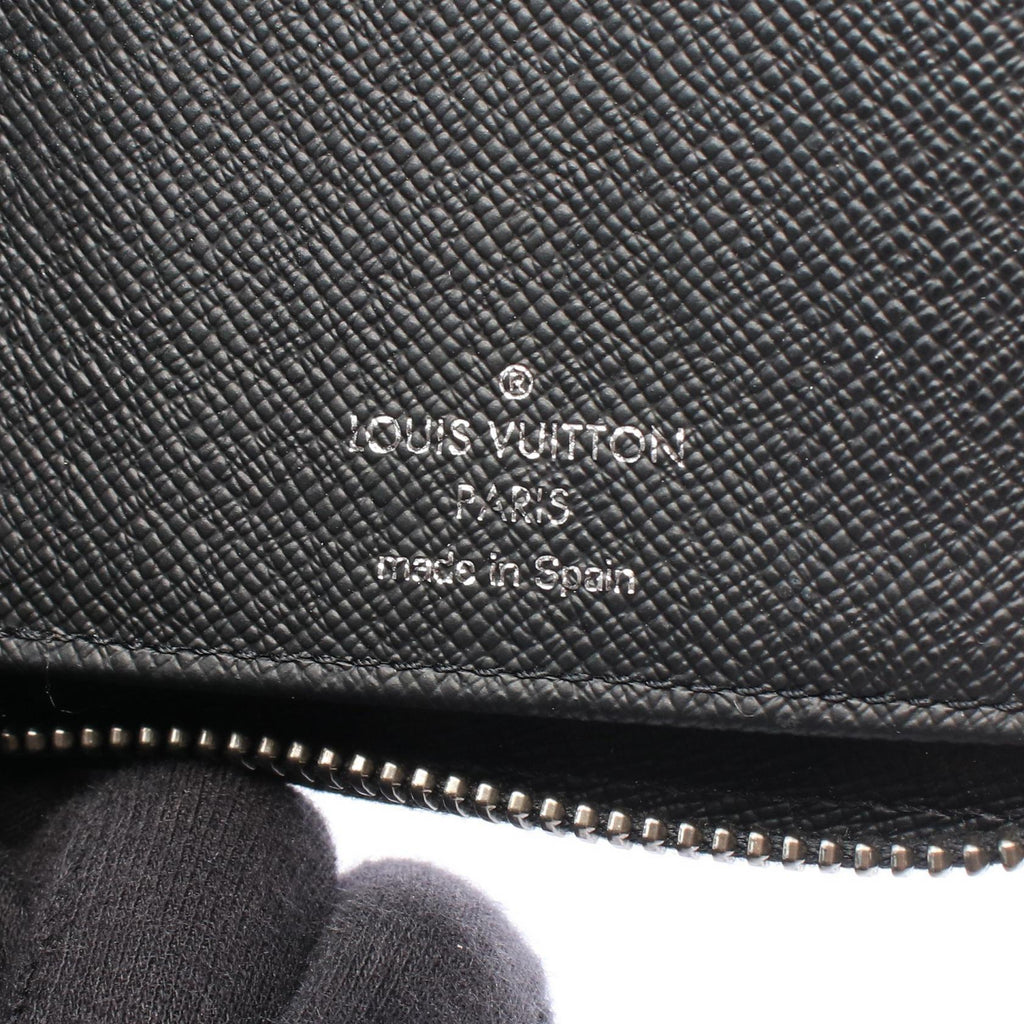 Louis Vuitton Zippy · Monogram Eclipse