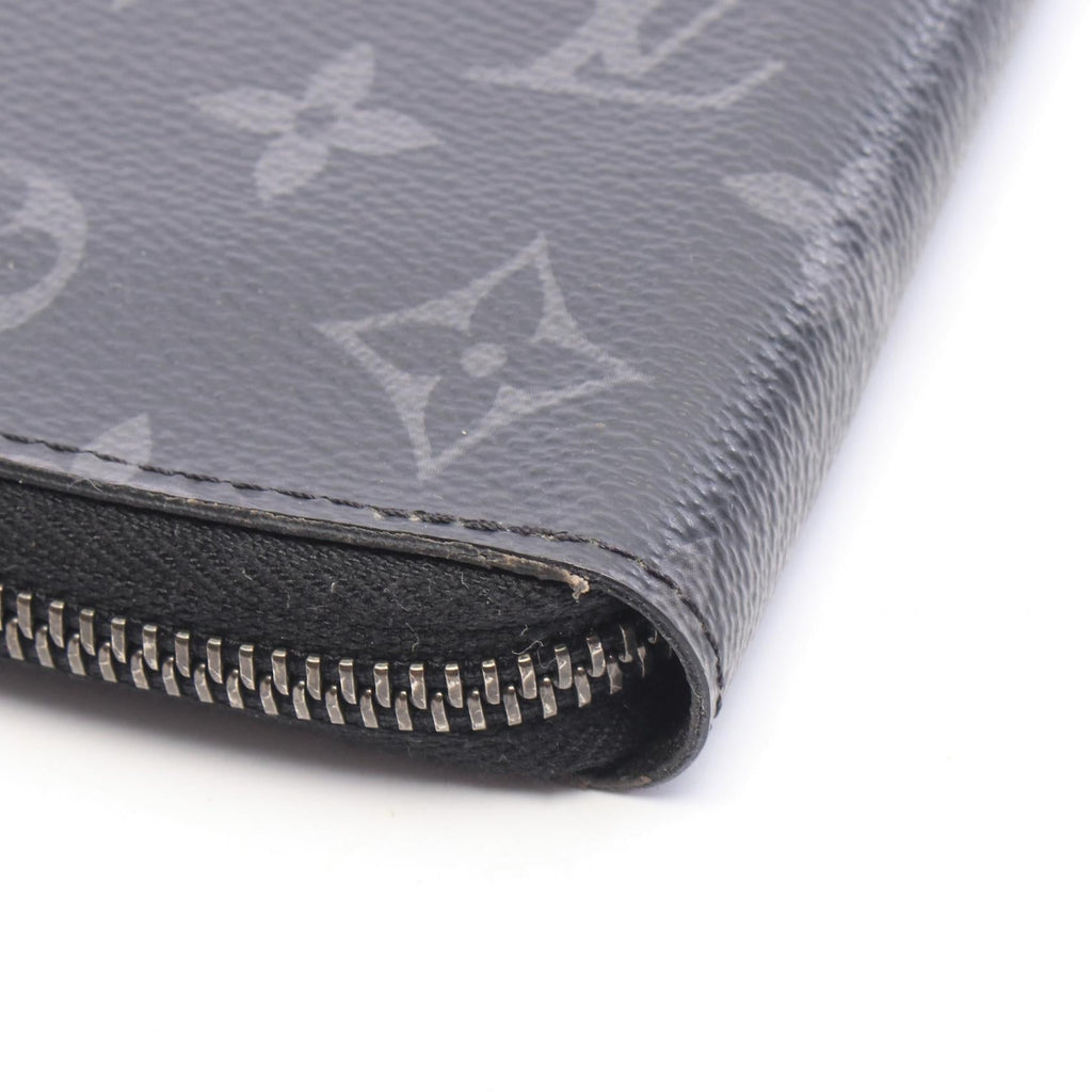 Louis Vuitton Zippy · Monogram Eclipse