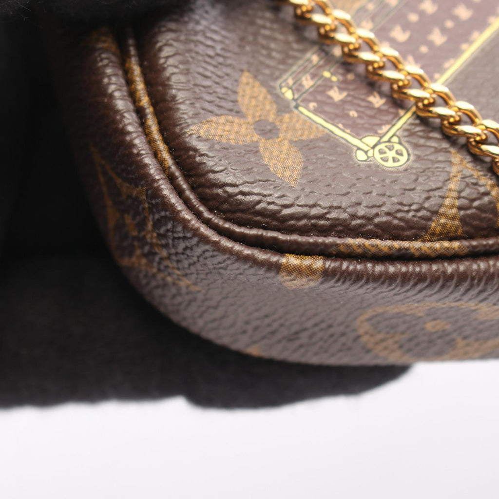 Louis Vuitton Mini Pochette · Monogram