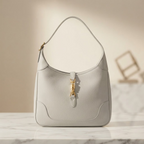 Hermès Trim 35 · Leather · Gold Hardware