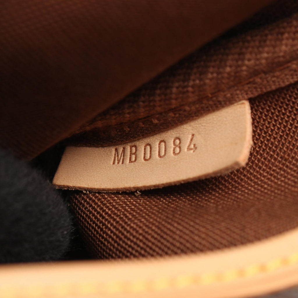 Louis Vuitton Saumur 30 · Monogram Canvas