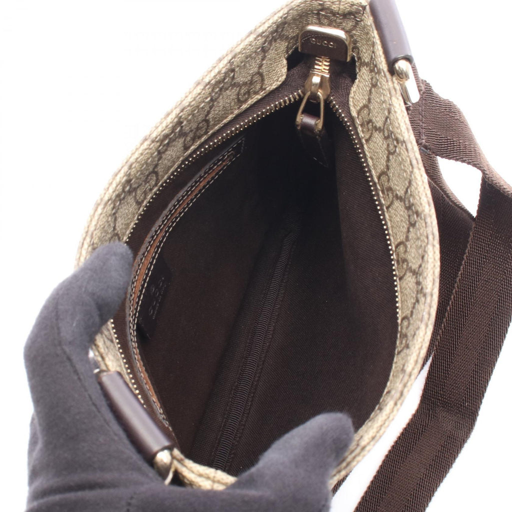Gucci GG Supreme · Canvas Leather