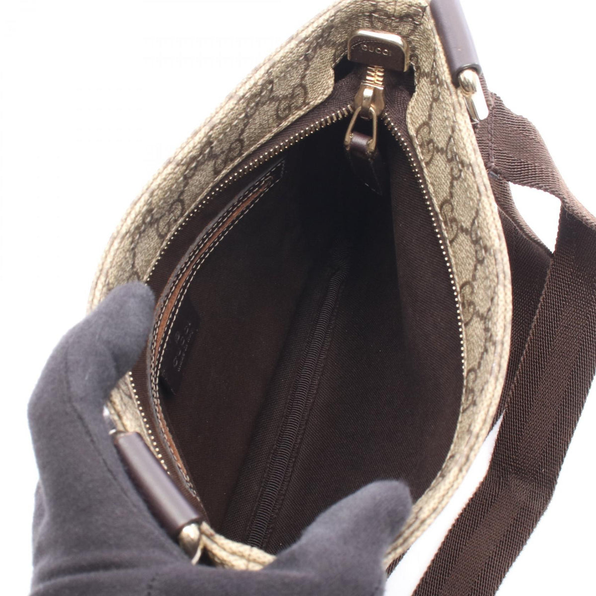 Gucci GG Supreme · Canvas Leather
