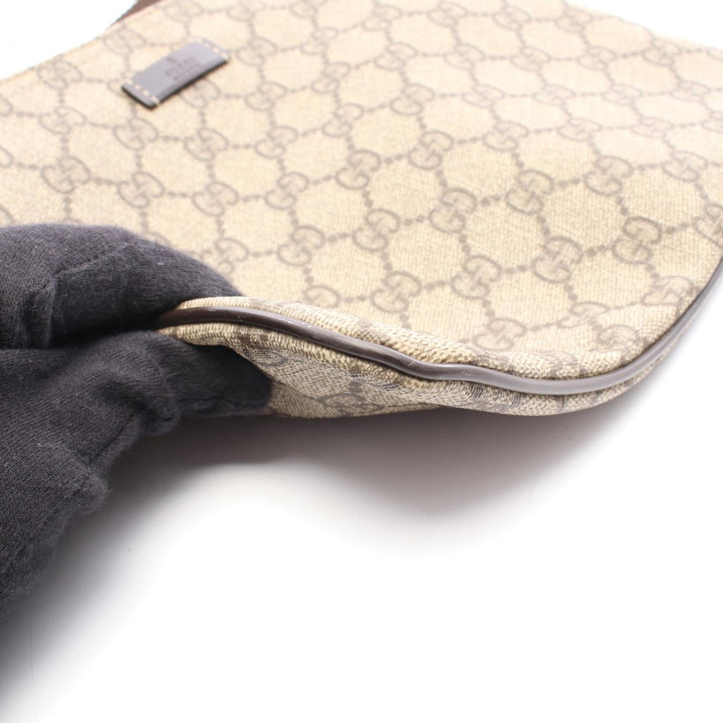 Gucci GG Supreme · Canvas Leather