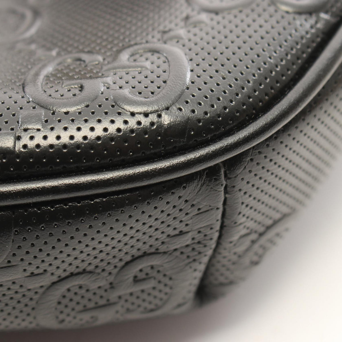 Gucci GG Embossed Belt Bag · Leather