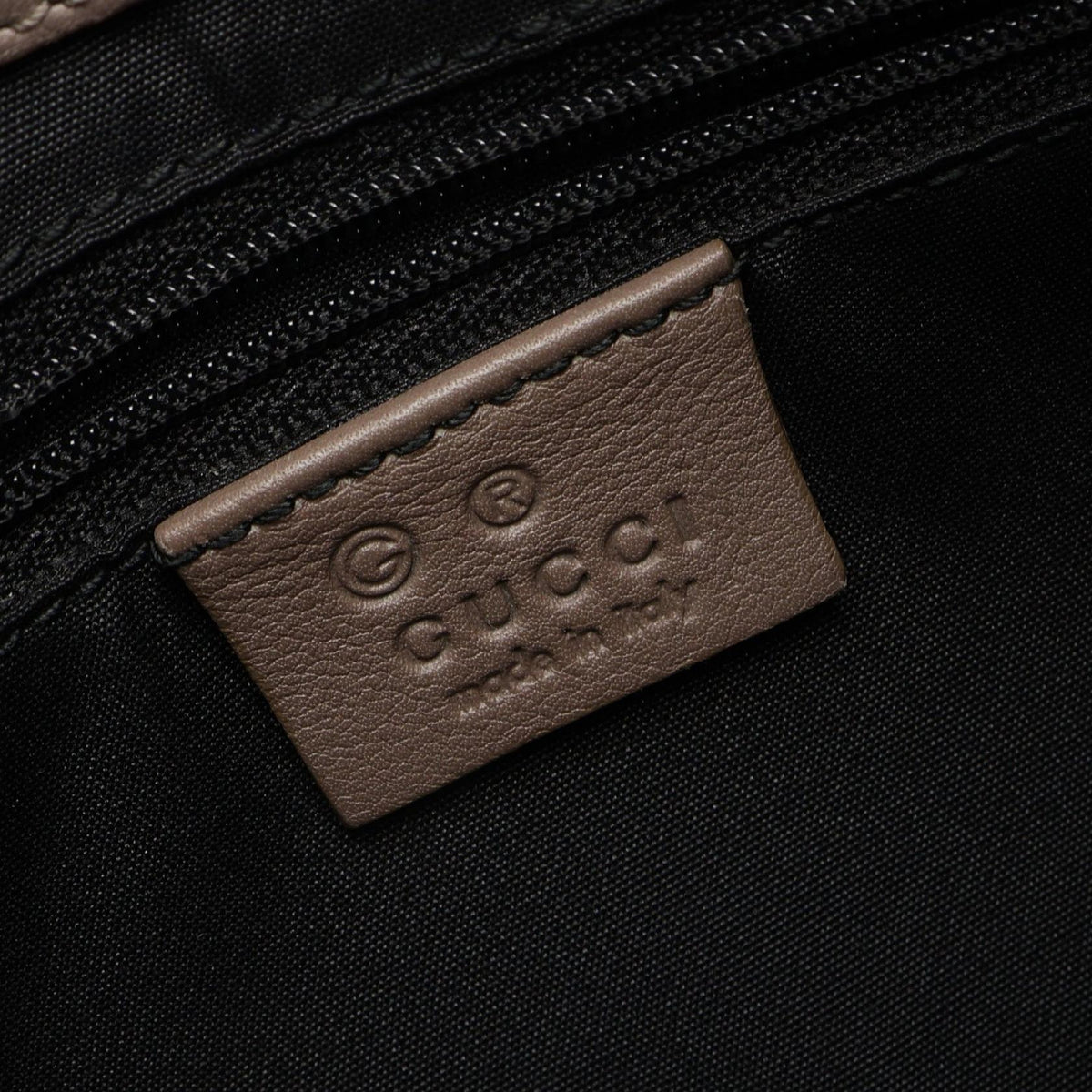 Gucci Guccissima · Canvas Leather