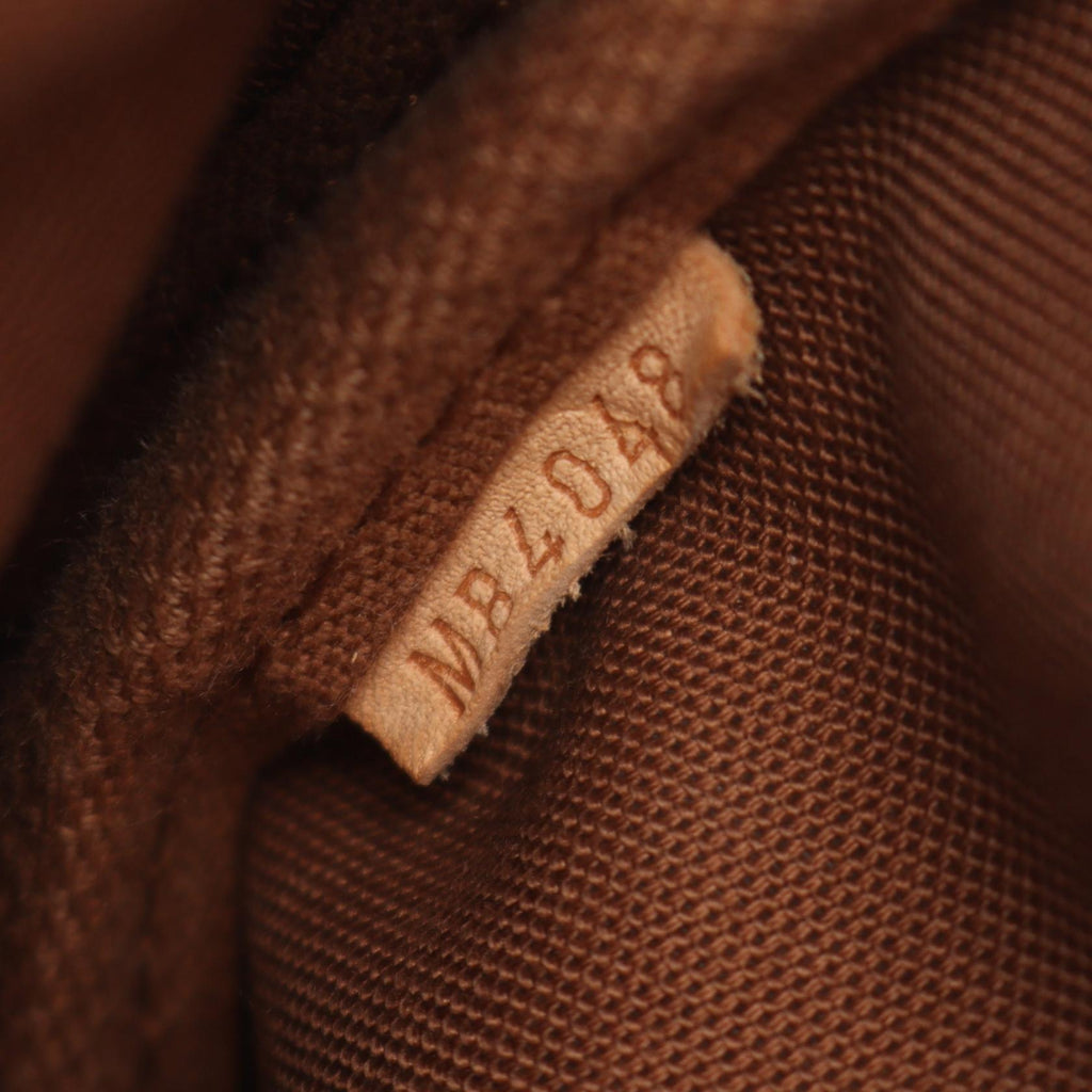 Louis Vuitton Saumur 30 · Monogram