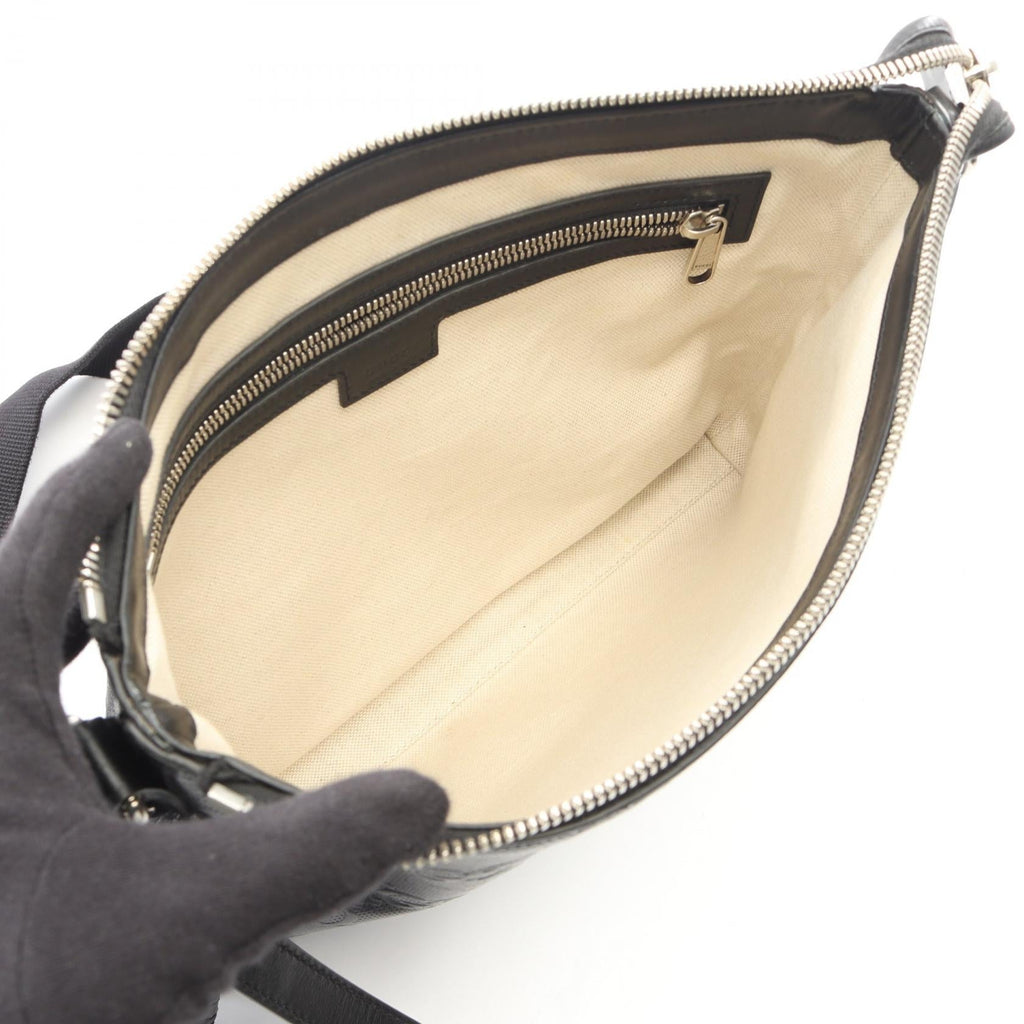 Gucci GG Embossed · Leather Messenger