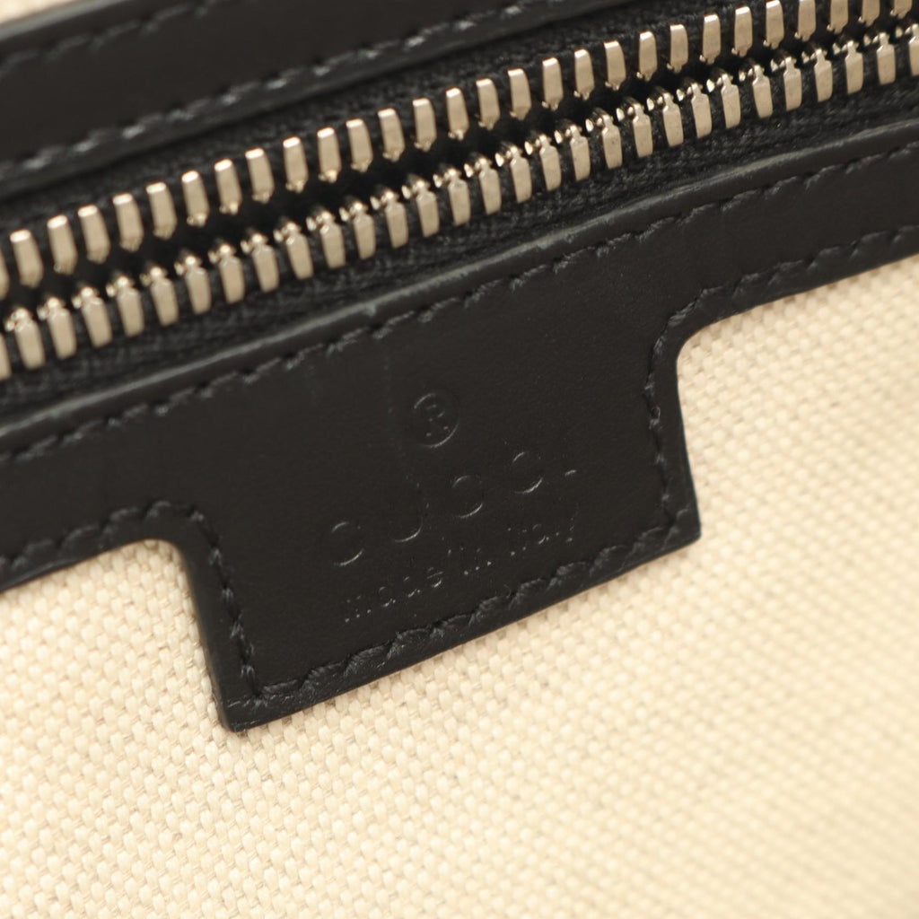 Gucci GG Embossed · Leather Messenger
