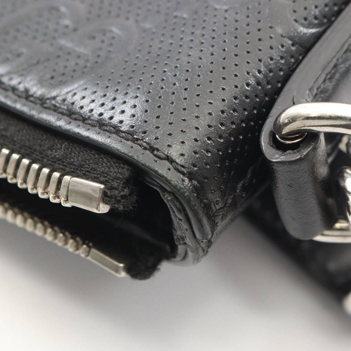 Gucci GG Embossed · Leather Messenger