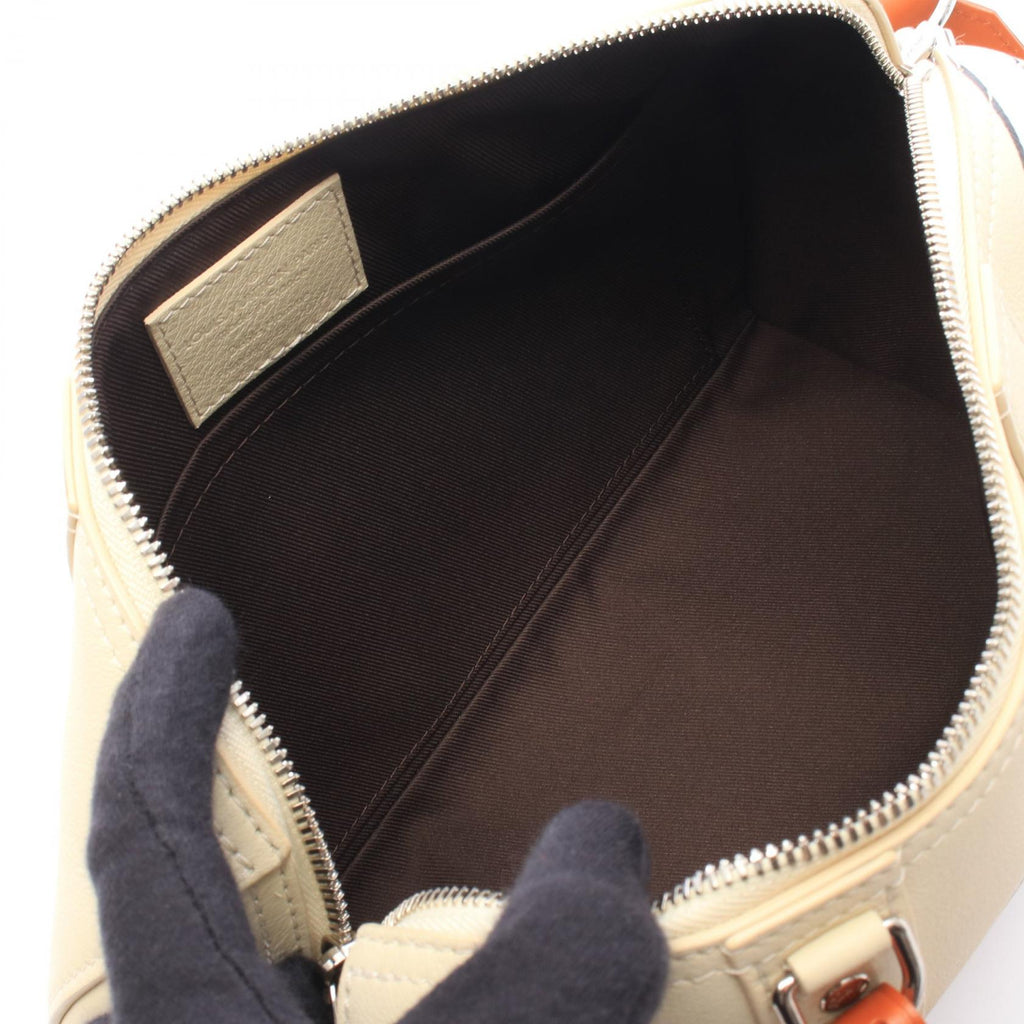 Louis Vuitton City Keepall · Leather
