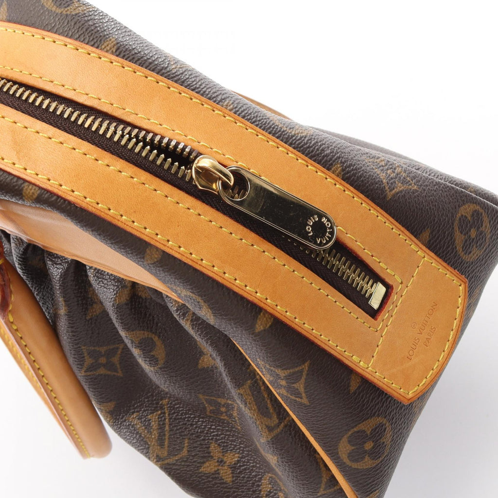Louis Vuitton Mizi · Monogram Canvas