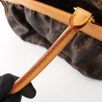 Louis Vuitton Mizi · Monogram Canvas
