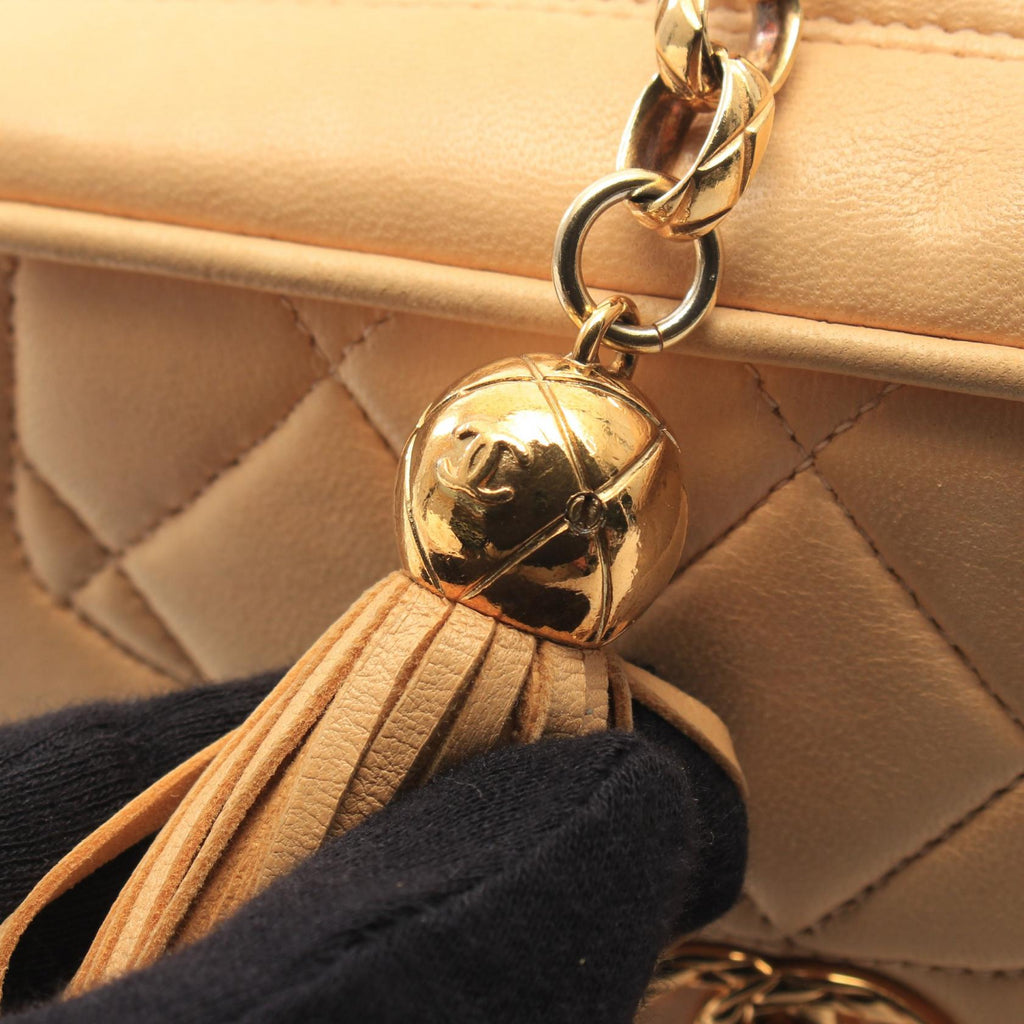 CHANEL Matelassé Tassel · Lambskin