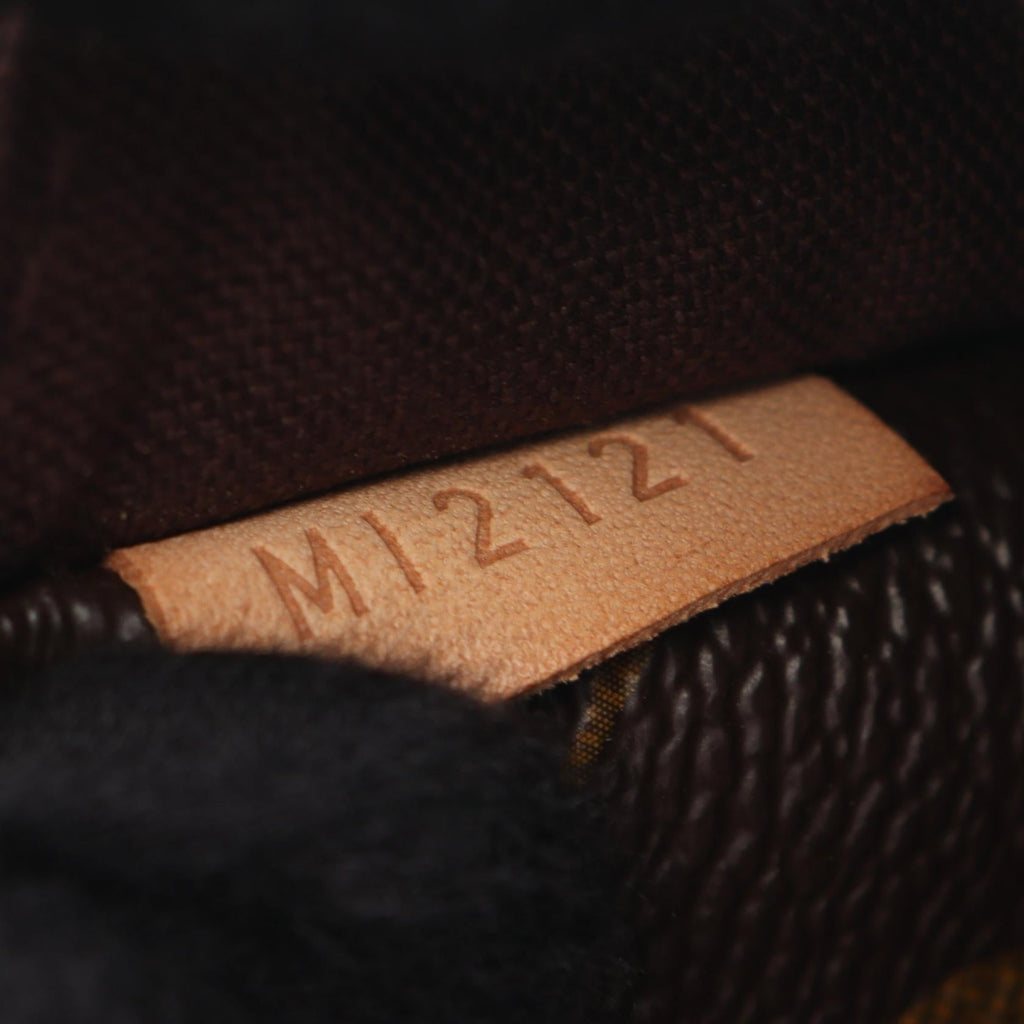 LOUIS VUITTON Menilmontant MM · Monogram