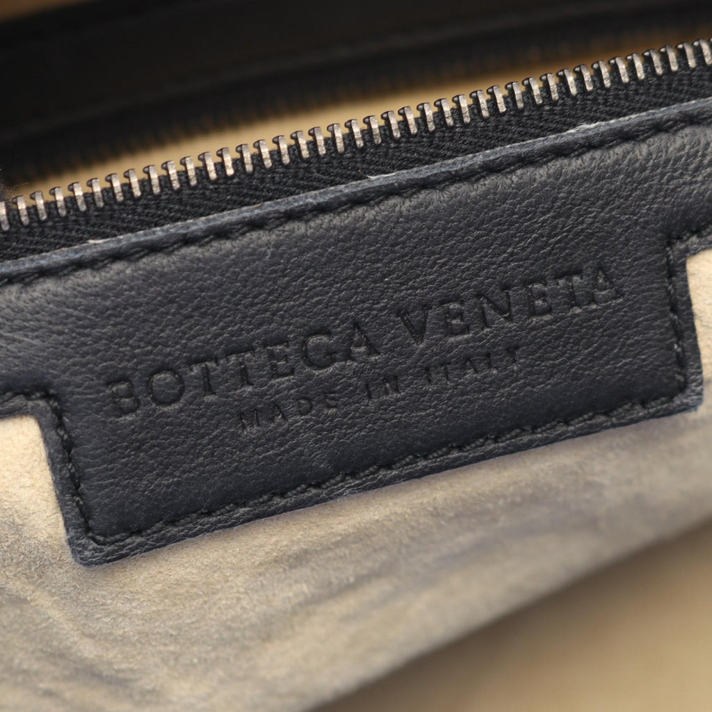 BOTTEGA VENETA Intrecciato · Leather