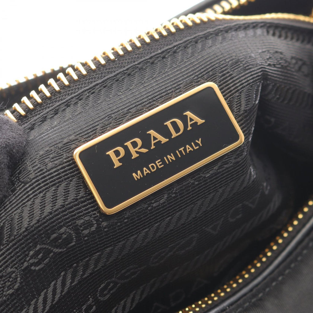 Prada Tessuto · Nylon & Leather